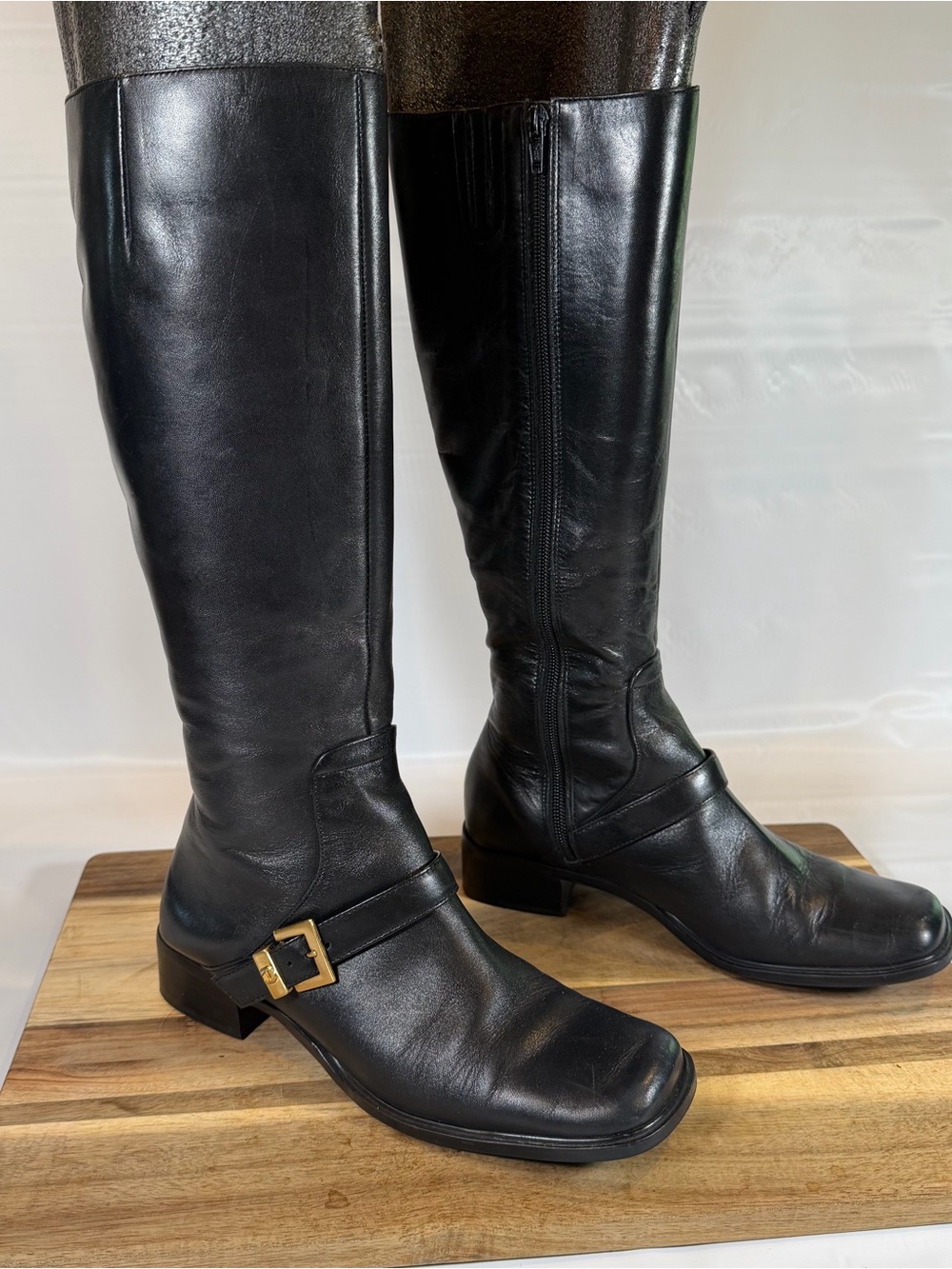 Woman’s vintage Etienne Aigner black leather knee-high boots gold buckle 7.5 M